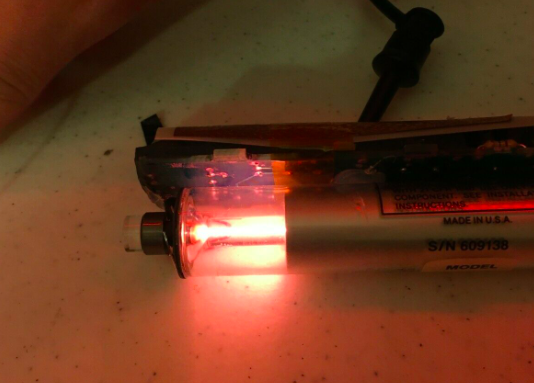 The laser tube from the MH290 lasing.