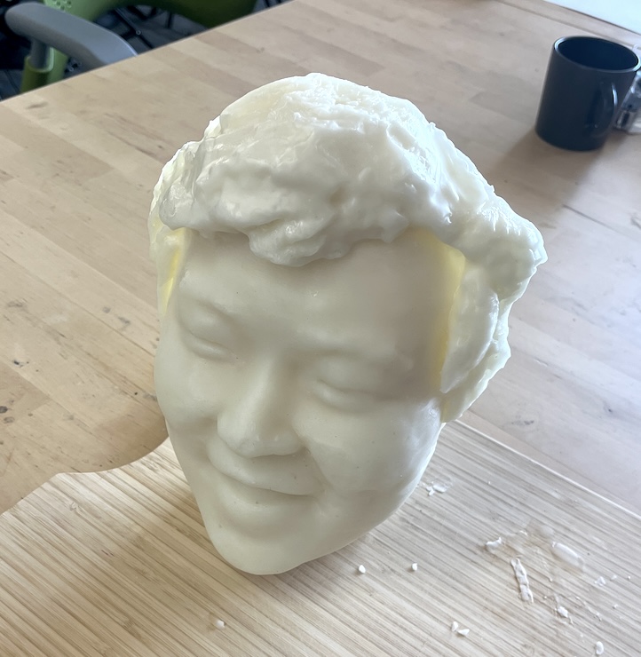 Face candle standing