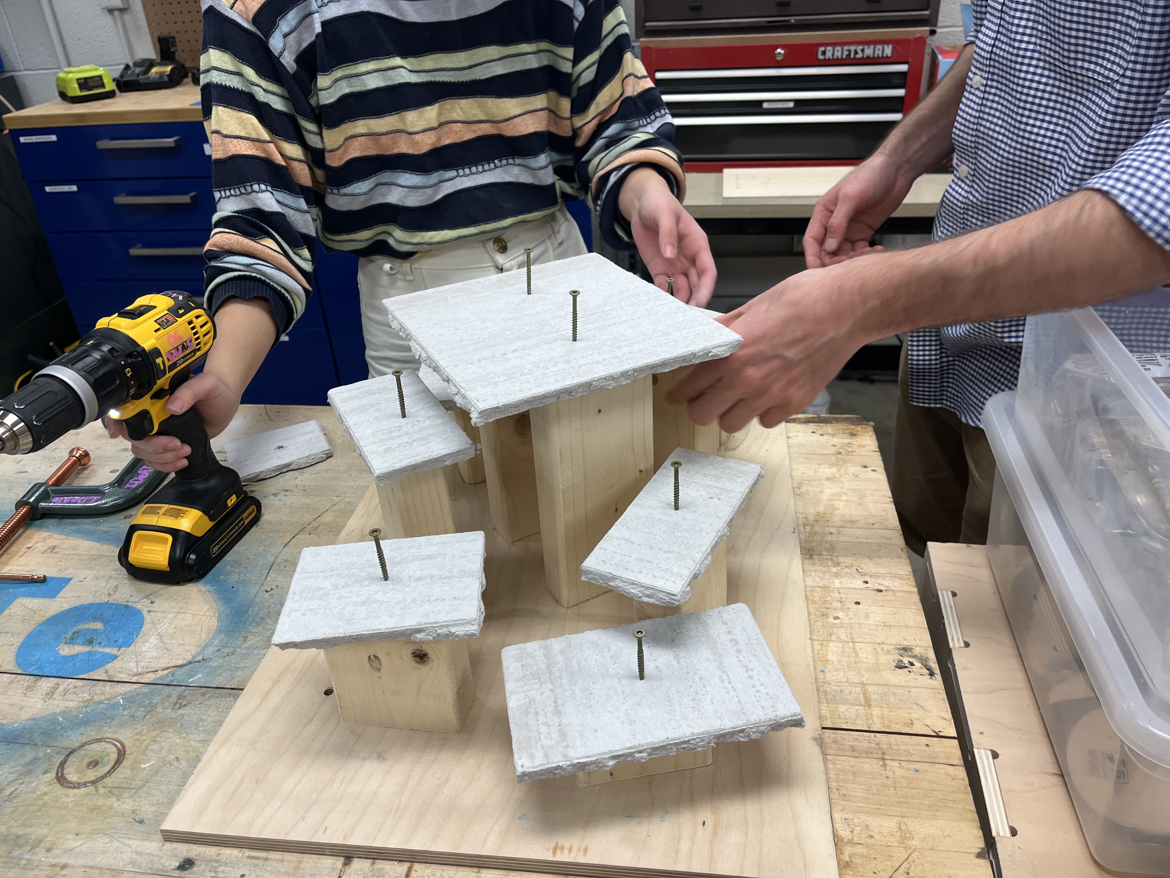 The concrete platforms on their wooden pegs, pre-drilling.