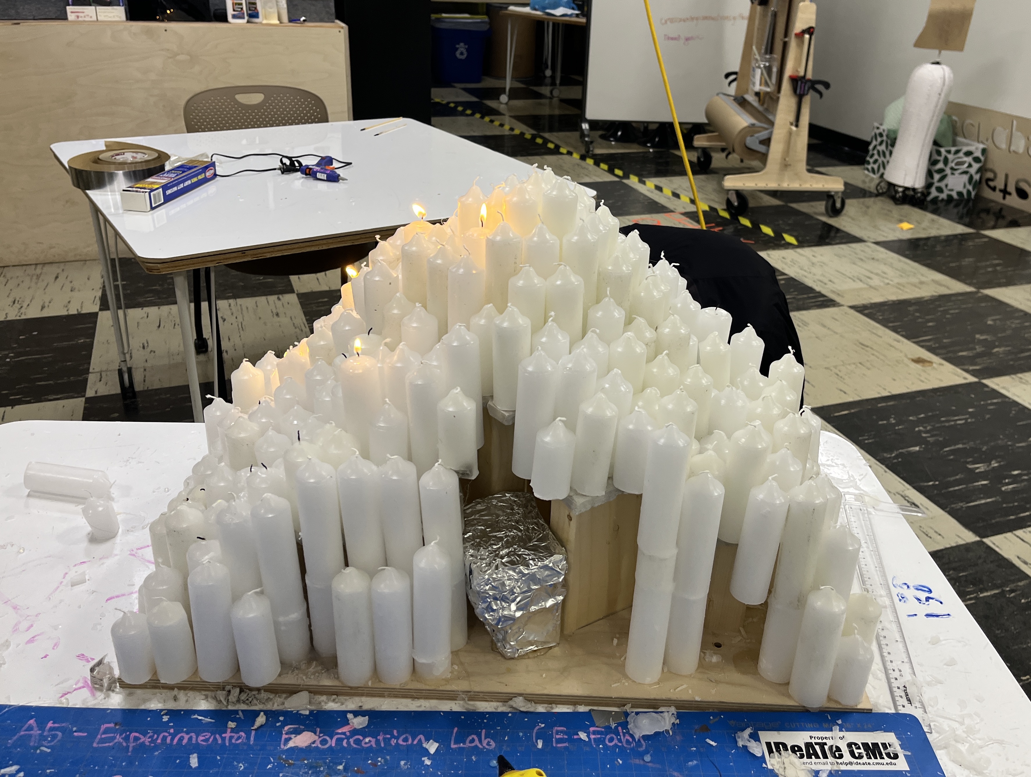 Post-cut candles, with some big ones in front. We've glued a few to be floating, and the insides are still visible.