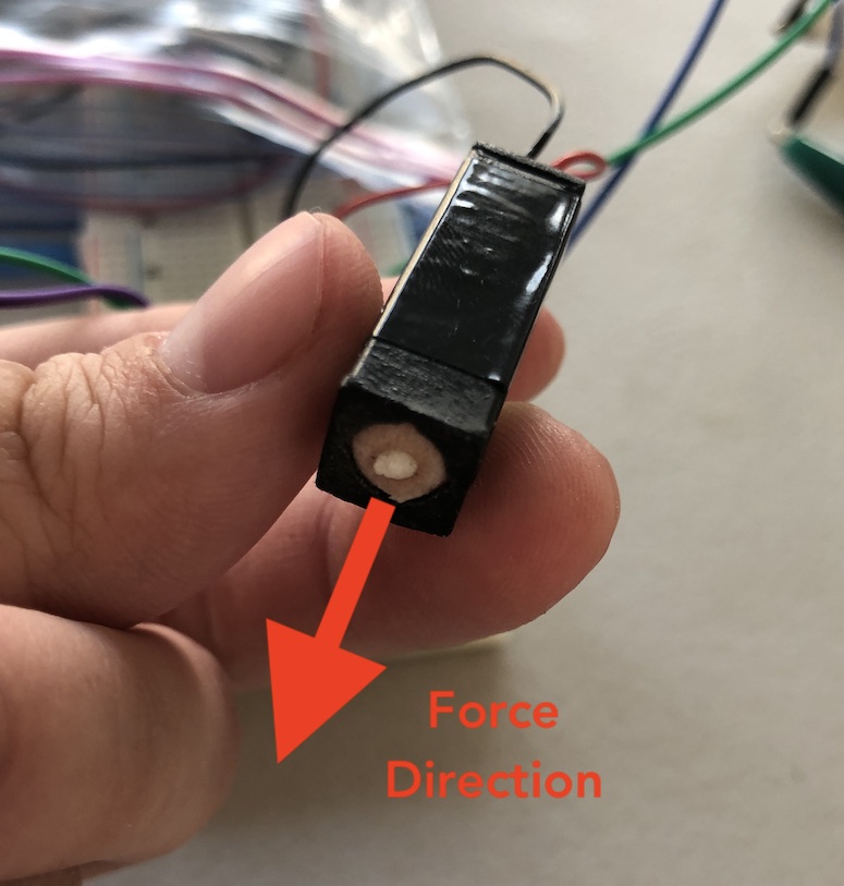 Linear actuator I used. The little white pin is the weight, and it creates the force sensation in the length-wise axis